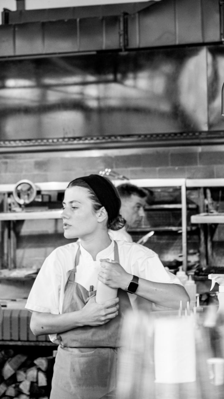 chefs at work in a restaurant kitchen